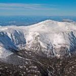 An aerial view of a snow covered mountain in New Hampshire.