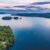 A tranquil lake in the New Hampshire woods at dusk.